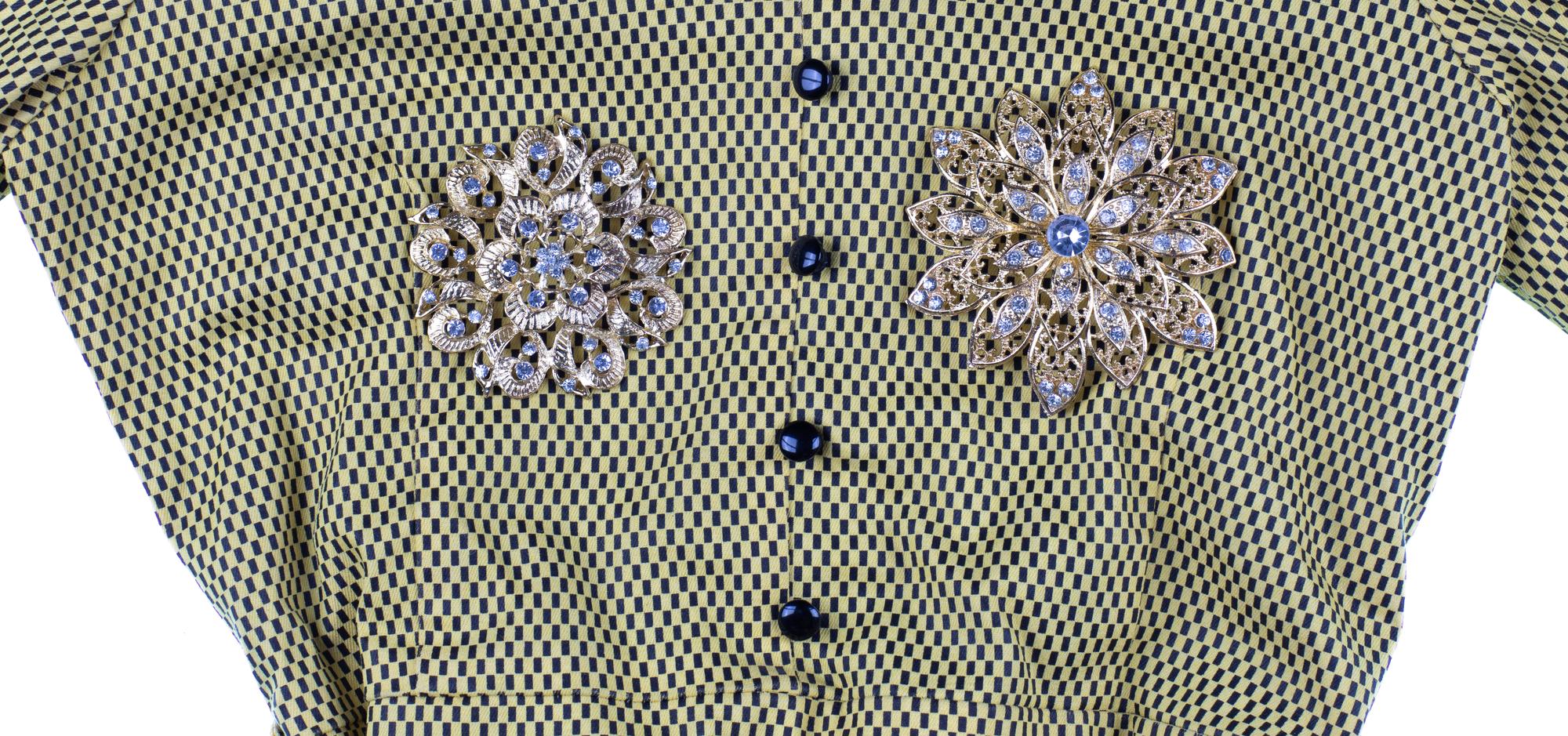 Large embroidered panel on jacket showing geometric motif
